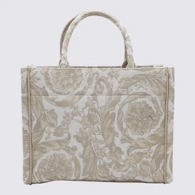 Shop Versace Bags In Beige+beige- Gold