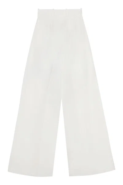 Shop Nina Ricci Cotton-linen Trousers In White
