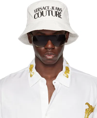 Shop Versace Jeans Couture White Logo Bucket Hat In E003 White