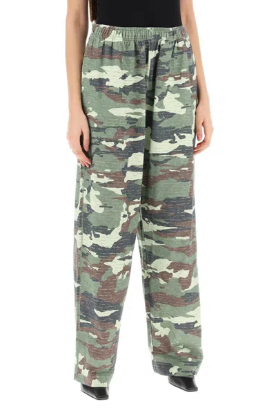 Shop Acne Studios Camouflage Jersey Pants For Men In Green