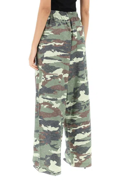 Shop Acne Studios Camouflage Jersey Pants For Men In Green