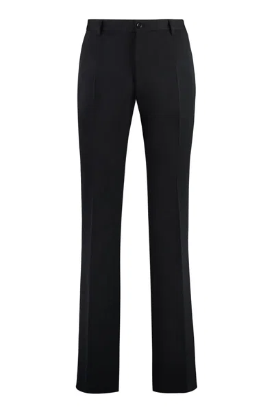 Shop Dolce & Gabbana Flared Wool Trousers In Black