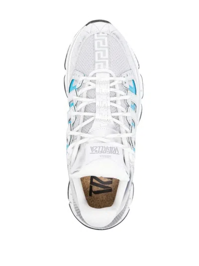 Shop Versace Trigreca Sneakers With Mesh Inserts And Design In Blu E Argento