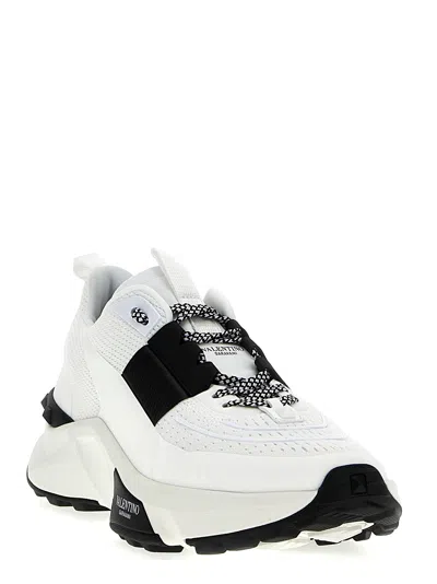 Shop Valentino True Act Sneakers White/black