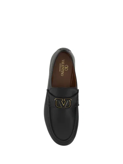 Shop Valentino Garavani Men  Garavani Vlogo Loafers In Black