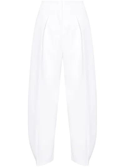 Shop Jacquemus Le Pantalon Ovalo Tapered-leg Trousers - Women's - Polyester/cotton/spandex/elastane In White