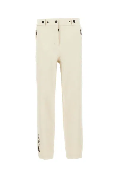 Shop Moncler Grenoble Straight Leg Trousers In Beige