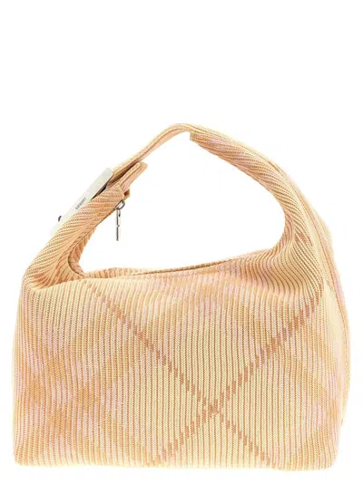 Shop Burberry Medium Peg Checked Duffle Tote Bag In Beige