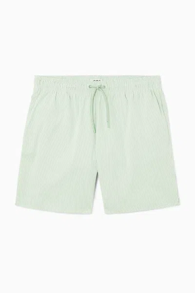 Shop Cos Striped Seersucker Swim Shorts In Green