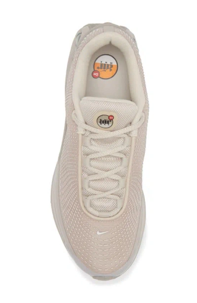 Shop Nike Air Max Dn Sneaker In Light Ore Wood Brown/ Phantom