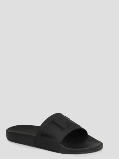 Shop Valentino Vltn Slide Sandals In Black