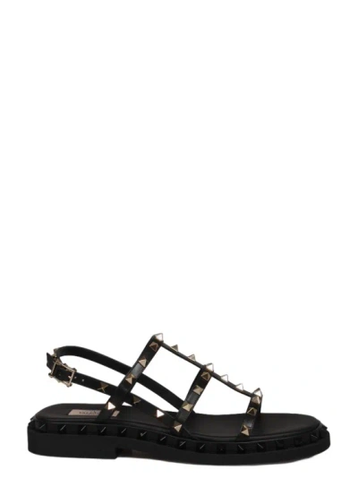 Shop Valentino Straps Calfskin Rockstud Sandal In Black