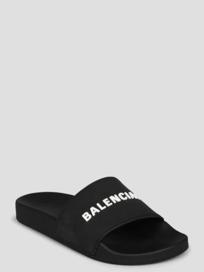 Shop Balenciaga Pool Slide Sandal In Black
