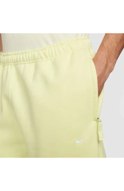 Shop Nike Solo Swoosh Fleece Sweatpants In Luminous Green/ White