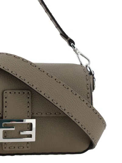 Shop Fendi Baguette Handbag In Brown