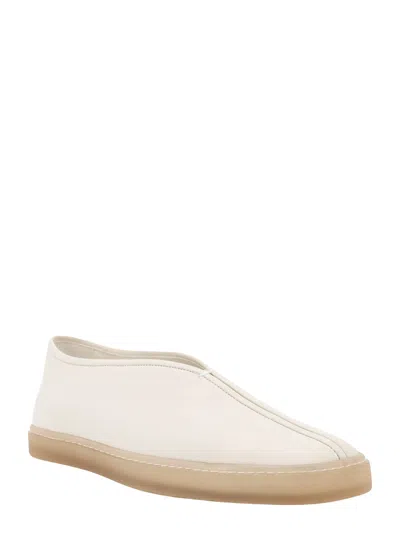 Shop Lemaire Piped Sneakers In White