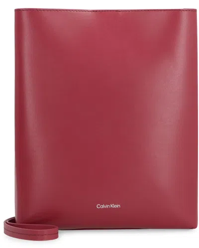 Shop Calvin Klein Leather Crossbody Bag In Burgundy