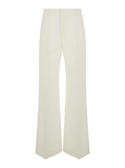 Shop Chloé White Flared Trousers In Wool And Silk Woman