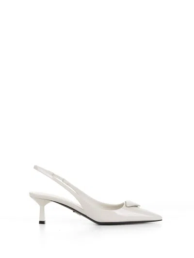 Shop Prada Brushed Leather Slingback Pumps With Logo In Avorio