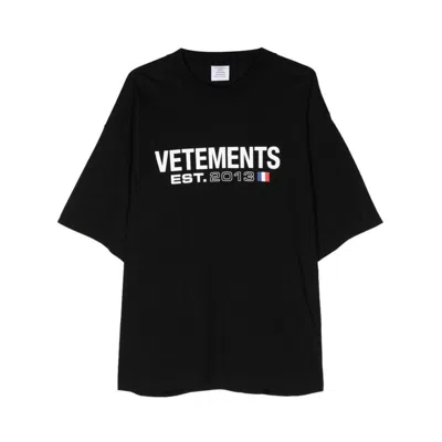 Shop Vetements Logo Printed Oversized T-shirt In Black