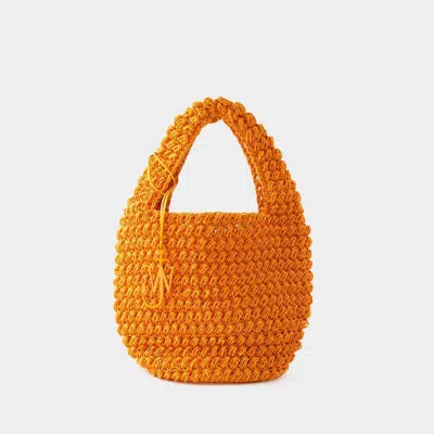 Shop Jw Anderson J.w. Anderson Logo Charm Popcorn Large Basket Bag In Orange