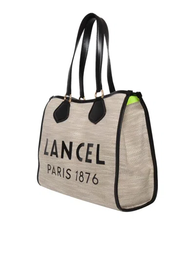 Shop Lancel Hand Held Bag. In Beige