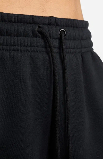 Shop Nike Phoenix Oversize Fleece Sweatpants In Black/ Sail