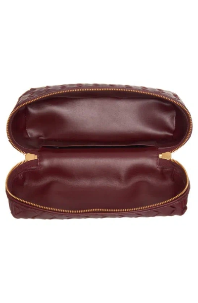 Shop Bottega Veneta Intrecciato Leather Convertible Vanity Case In Cherry/ Gold