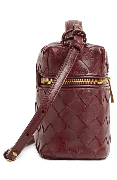 Shop Bottega Veneta Intrecciato Leather Convertible Vanity Case In Cherry/ Gold