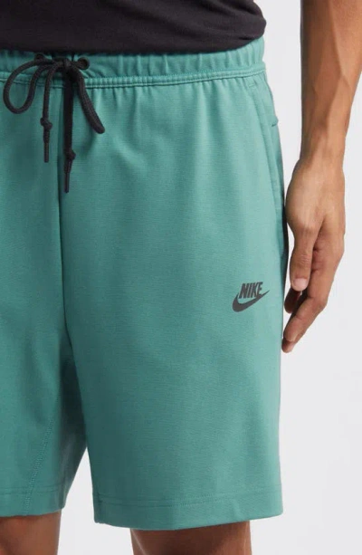 Shop Nike Lightweight Tech Knit Shorts In Bicoastal/ Black