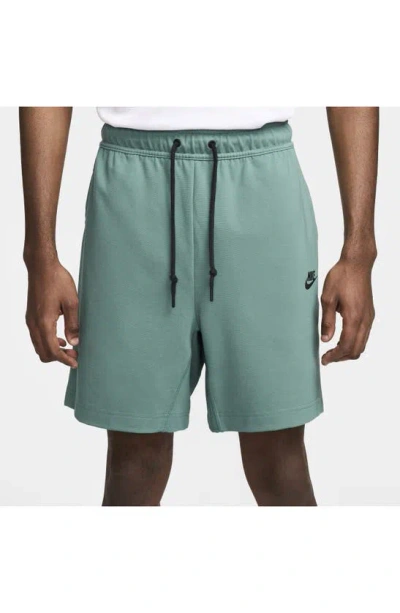 Shop Nike Lightweight Tech Knit Shorts In Bicoastal/ Black