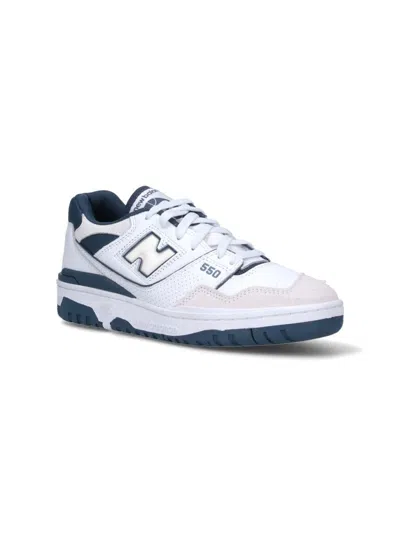 Shop New Balance Sneakers In White