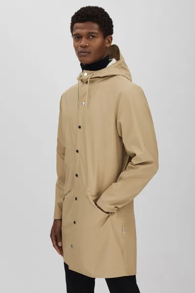 Shop Rains Longline Hooded Raincoat In Sand