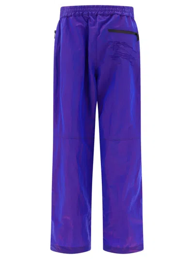 Shop Burberry Shimmering Trousers In Purple