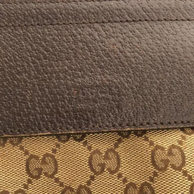 Shop Gucci Gg Pattern Beige Canvas Clutch Bag ()