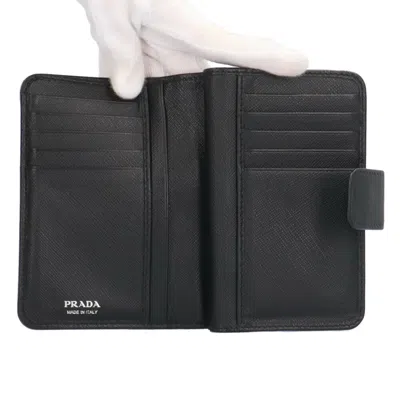 Shop Prada Black Synthetic Wallet  ()
