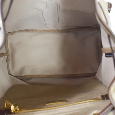 Shop Prada Logo Jacquard Brown Canvas Backpack Bag ()