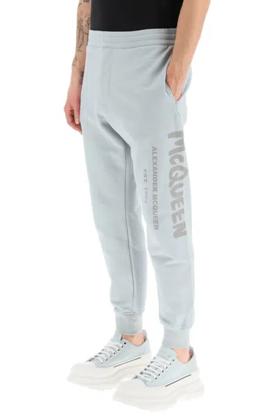 Shop Alexander Mcqueen Mcqueen Graffiti Sweatpants Men In Blue