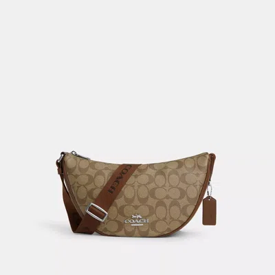 Shop Coach Pace Shoulder Bag In Signature Canvas In Brown