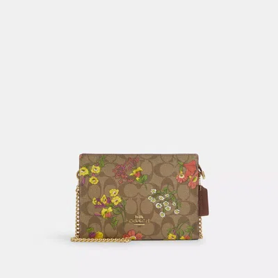 Shop Coach Slim Crossbody In Signature Canvas With Floral Print In Beige