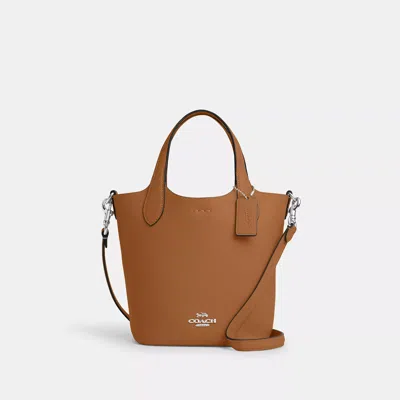 Shop Coach Hanna Bucket Bag In Brown