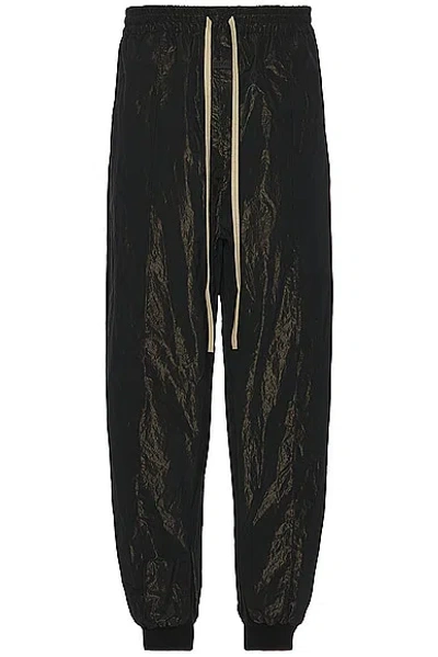 Shop Fear Of God Wrinkled Polyester Pintuck Sweatpant In Black