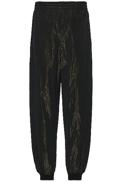 Shop Fear Of God Wrinkled Polyester Pintuck Sweatpant In Black