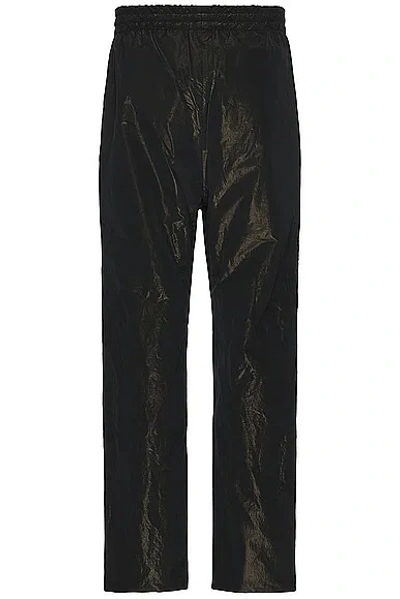 Shop Fear Of God Wrinkled Polyester Forum Pant In Black