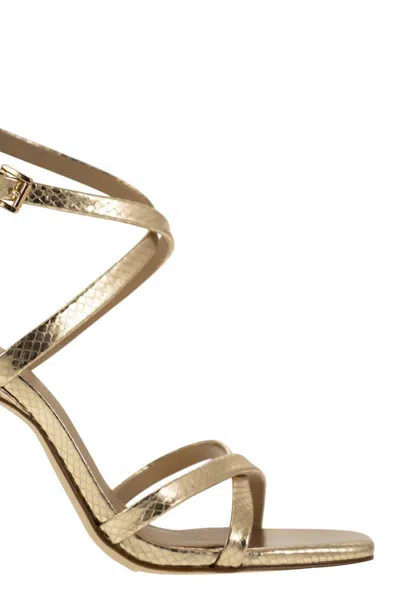 Shop Michael Kors Celia Sandal In Metallic Snake Print Leather In Gold
