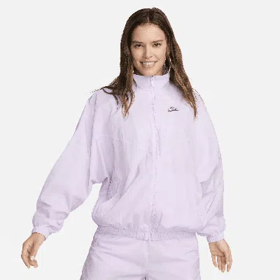 Shop Nike Women's  Sportswear Essential Windrunner Woven Jacket In Purple