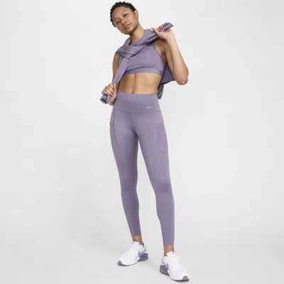 Shop Nike Women's Go Firm-support High-waisted 7/8 Leggings With Pockets In Purple