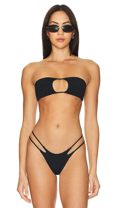 Shop Indah Janice Solid Smocked Bandeau Bikini Top In Black