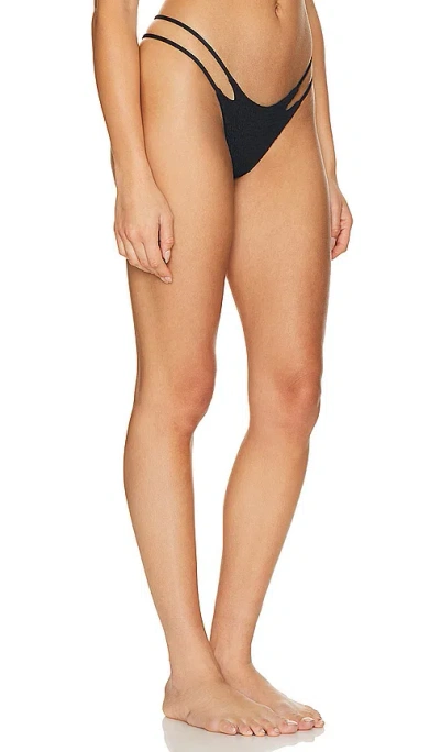Shop Indah Jovi Skimpy Solid Smocked String Bikini Bottom In Black