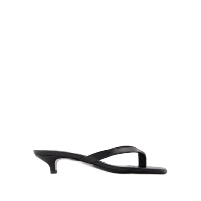 Shop Totême The Flip Flop Sandals - Leather - Black